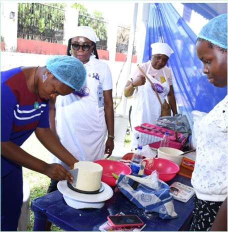 Participants at a cake decoration class